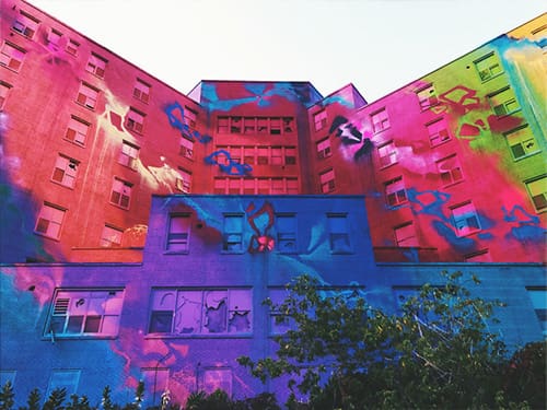 Artist: RiskRock. Curated by Kwest. Surface Art was a proud sponsor of UP Here's 2019 Installation: Los Angeles based RiskRock transformed the Old St. Joseph's Hospital in Sudbury, ON into Canada’s Largest Mural